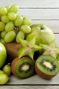 green-fruits-on-a-tabletop