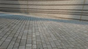 The stone paved road in front of the hotel